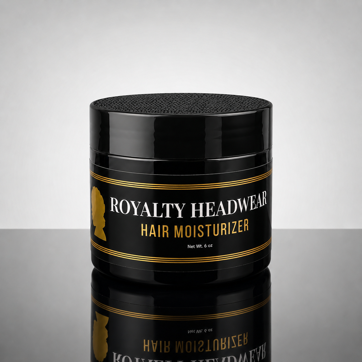 Royalty Headwear Hair Moisturizer in a black 6 oz jar on a reflective surface for textured hair hydration and moisture retention